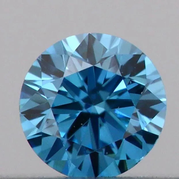 0.09ct round lab grown diamond (colour fancy vivid blue, clarity vs1, cut vg, igi certified)