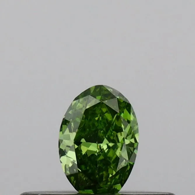 0.14ct oval lab grown diamond (colour fancy vivid green, clarity vs2, igi certified)