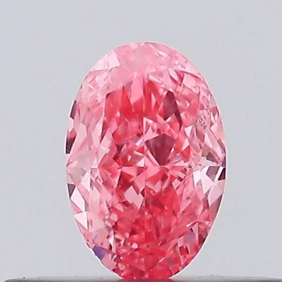 0.27ct oval lab grown diamond (colour fancy vivid pink, clarity vvs2, igi certified)