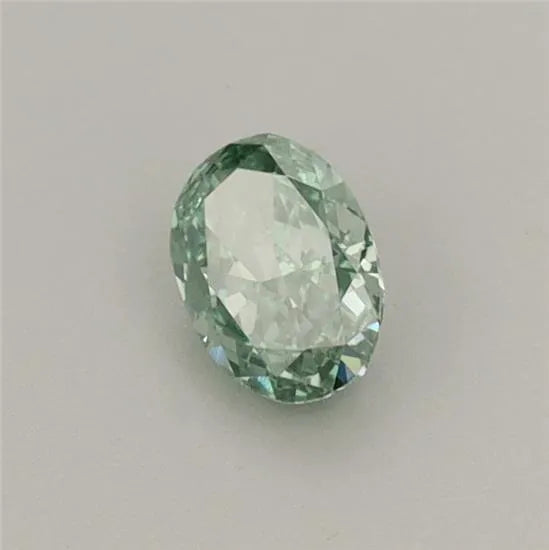 0.31ct oval lab grown diamond (colour fancy vivid green, clarity vvs2, igi certified)