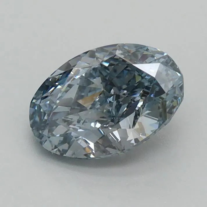 1.01ct oval lab grown diamond (colour fancy vivid blue, clarity vs1, igi certified)