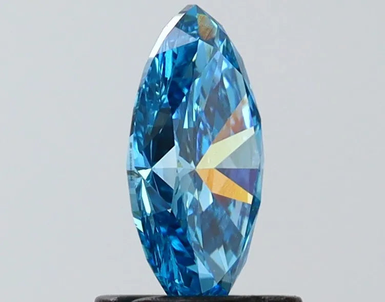 1.02ct marquise lab grown diamond (colour fancy vivid blue, clarity vs1, igi certified)