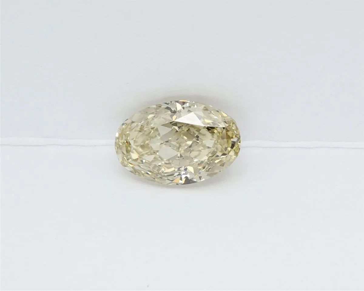 1.17ct oval lab grown diamond (colour fancy light gray yellow, clarity vvs2, igi certified)